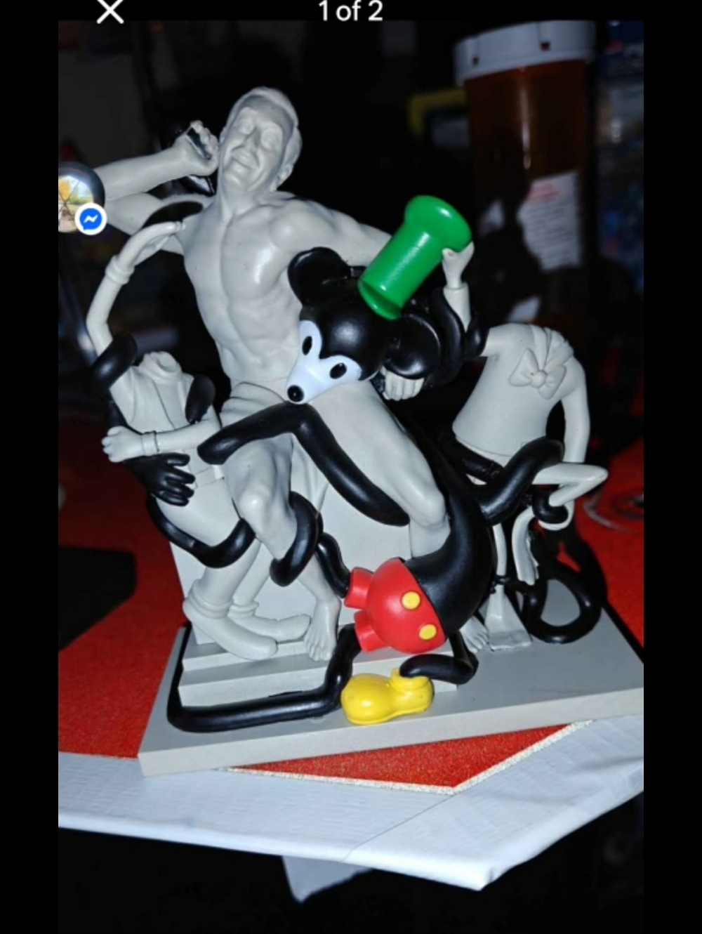 Black & White Cartoon Mouse Sculpture with Green Hat